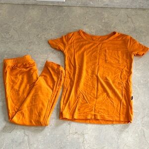 Kyte baby short sleeve and long pants pj set. Size 3T. In color Tangerine.